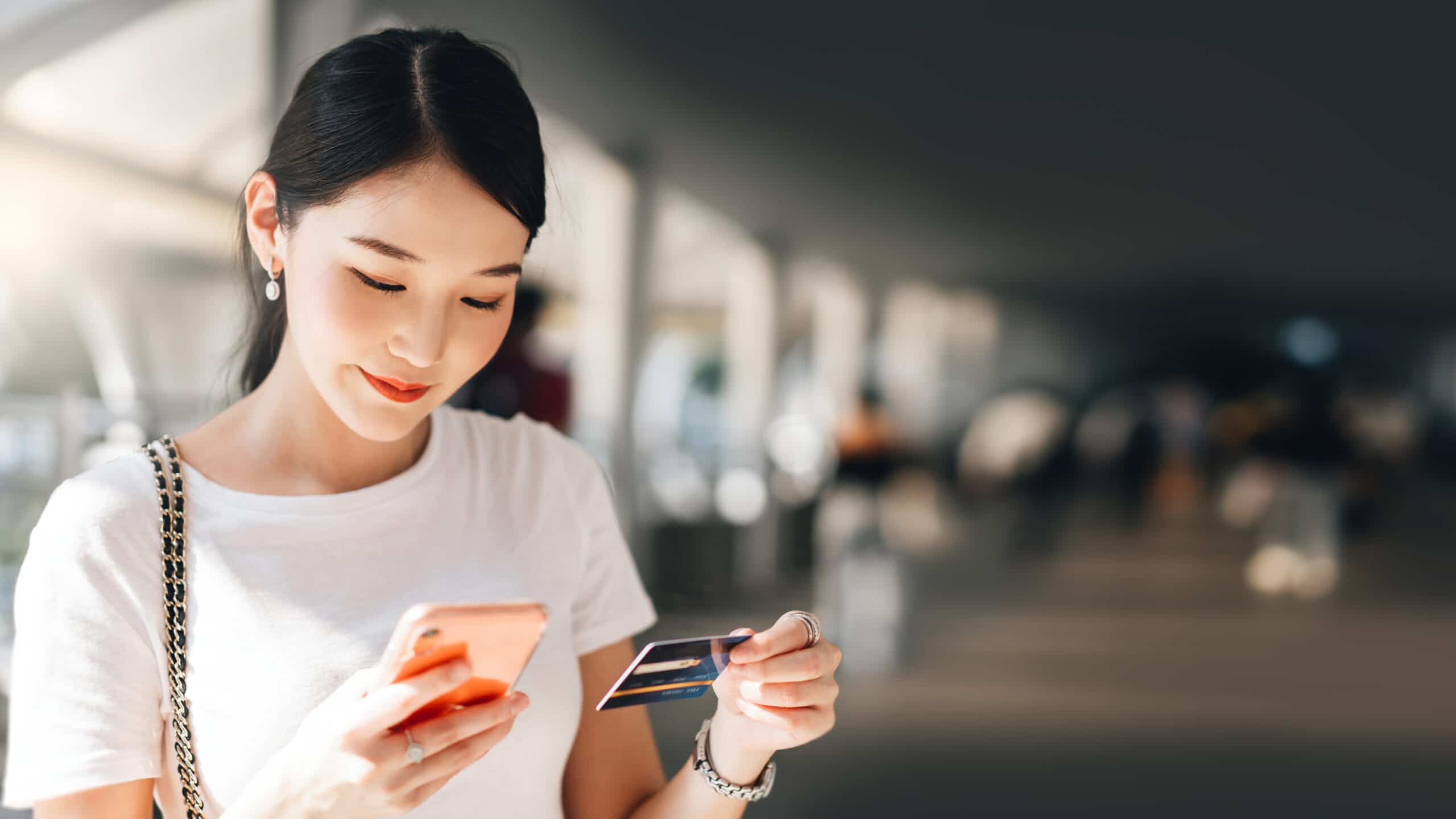 woman using credit card to pay over time